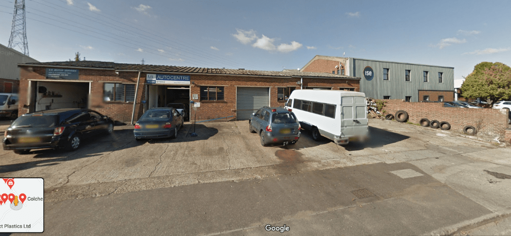 A car parked in a parking lot

Description automatically generated